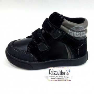 Botines negros de napa y...